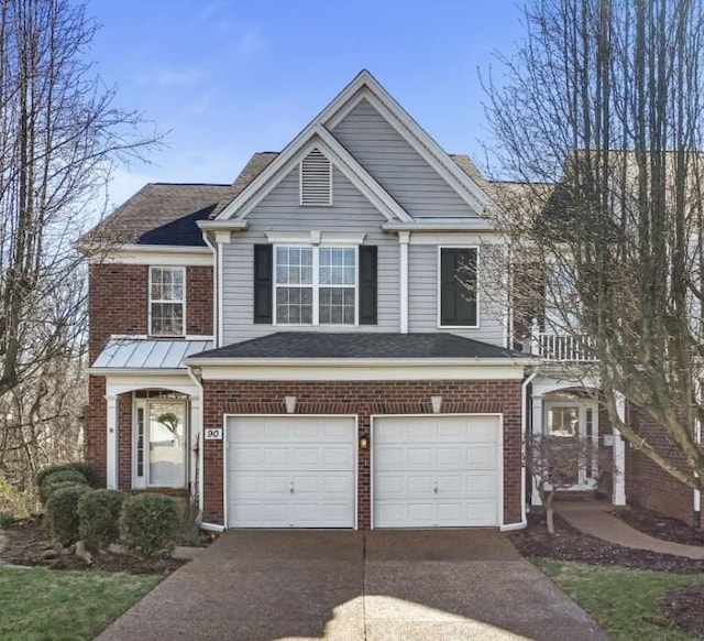 view of front of property featuring brick siding, an attached garage, and concrete driveway