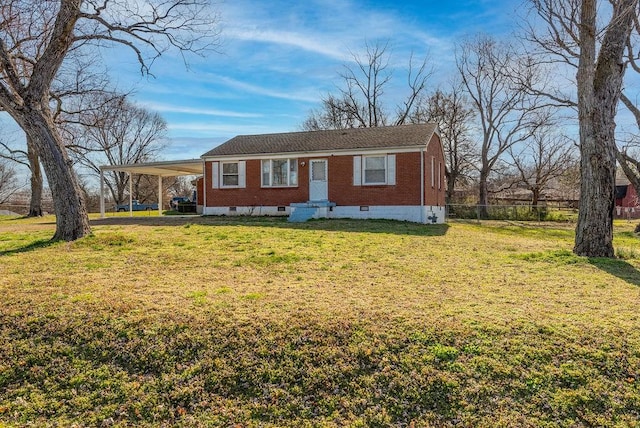 view of front facade with brick siding, an attached carport, a front lawn, fence, and crawl space