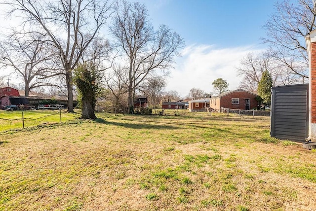 view of yard with fence