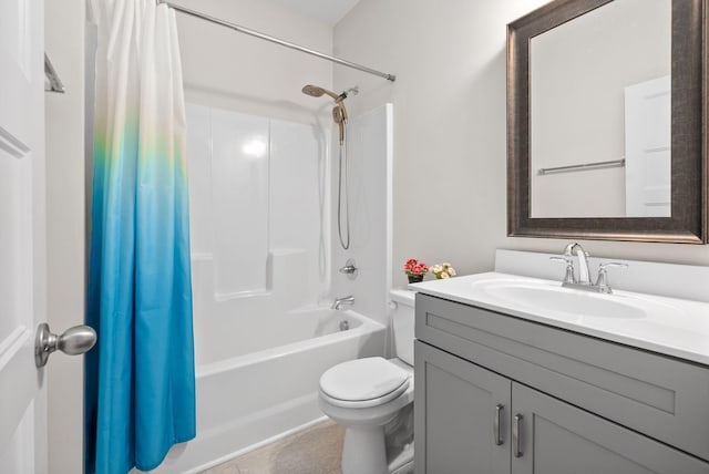 bathroom featuring vanity, shower / bath combination with curtain, toilet, and tile patterned floors