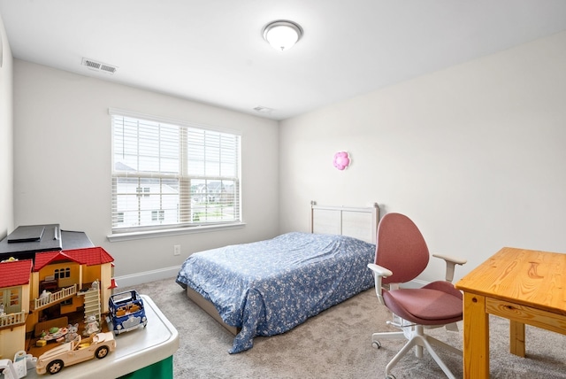 bedroom with carpet, visible vents, and baseboards