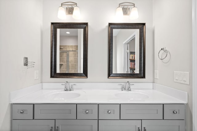 bathroom featuring double vanity and a sink