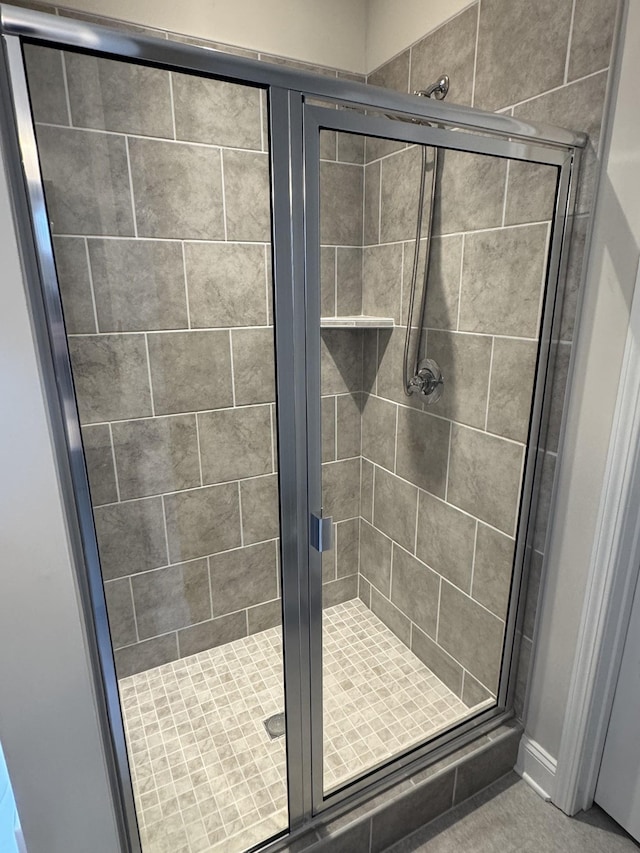 bathroom featuring a stall shower