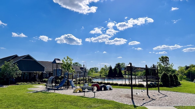 community playground featuring a yard