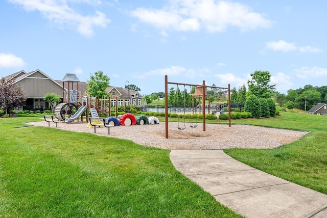 community play area featuring a lawn