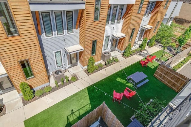 exterior space with fence and a residential view