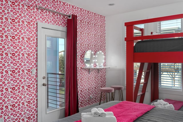 bedroom with wallpapered walls