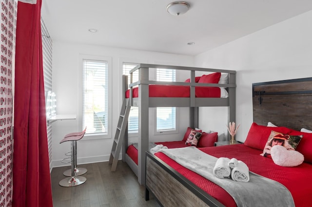 bedroom featuring recessed lighting, baseboards, and wood finished floors