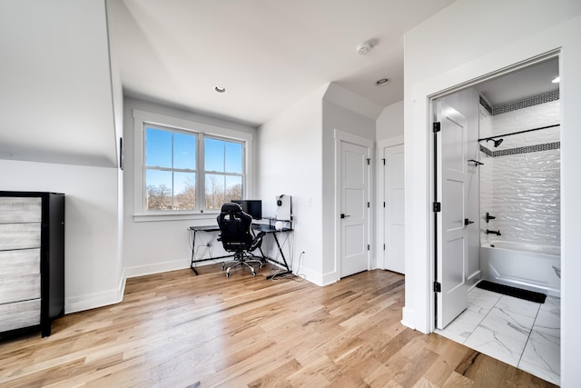 office area featuring recessed lighting, light wood-type flooring, and baseboards