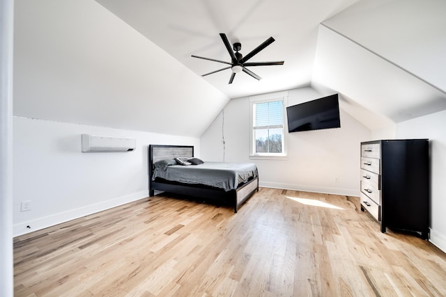 bedroom with light wood-style flooring, baseboards, lofted ceiling, and ceiling fan