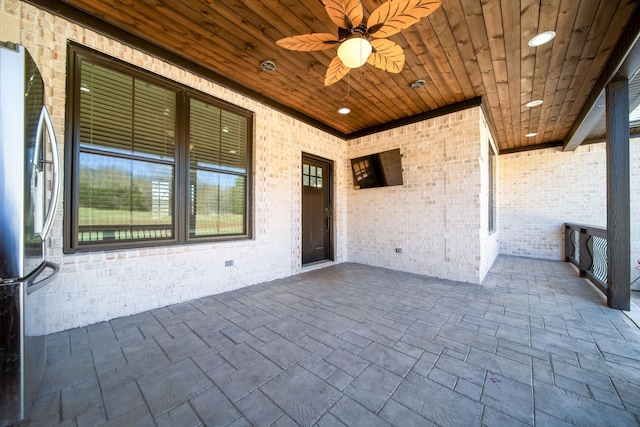 view of patio / terrace featuring ceiling fan