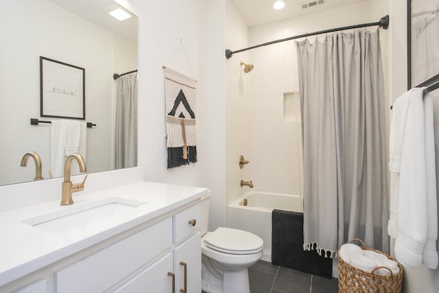 bathroom featuring tile patterned flooring, visible vents, toilet, vanity, and shower / bathtub combination with curtain