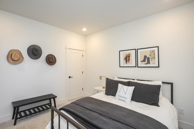 bedroom featuring recessed lighting, baseboards, and light colored carpet