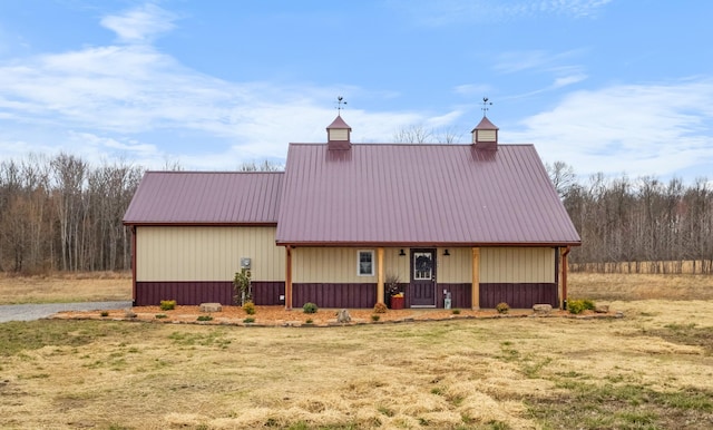 view of front of home featuring metal roof