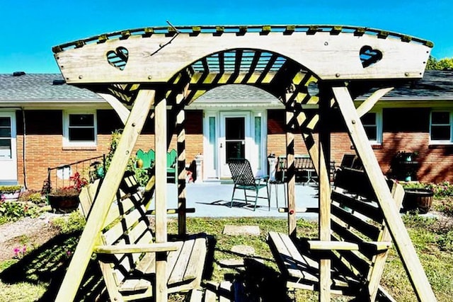 view of jungle gym with a patio area