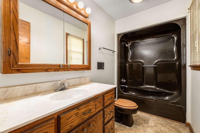 full bath with toilet and vanity