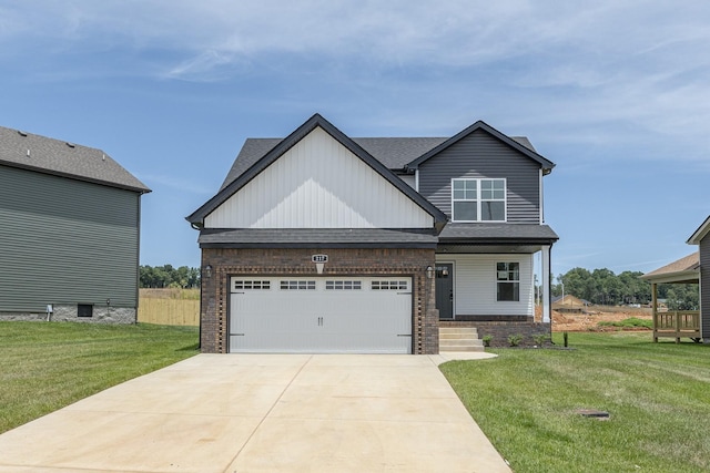 view of front of home with brick siding, concrete driveway, and a front yard