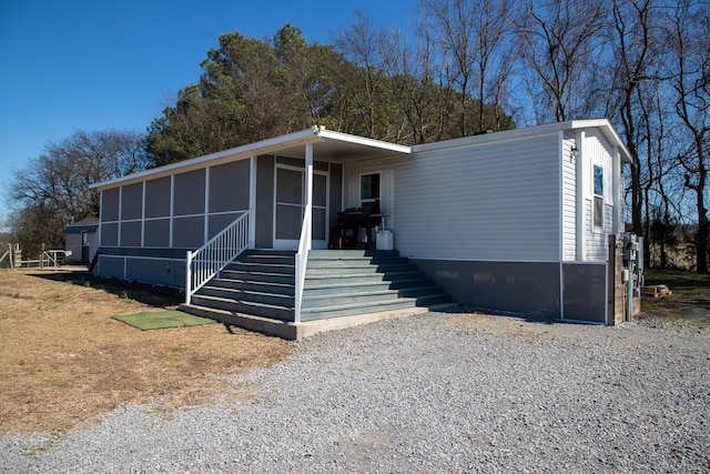 manufactured / mobile home featuring a sunroom