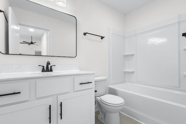 full bath featuring toilet, shower / washtub combination, ceiling fan, and vanity