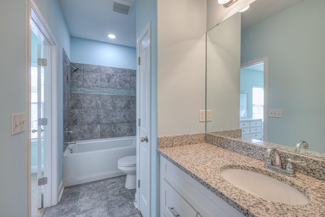 full bath with visible vents, toilet, bathtub / shower combination, and vanity