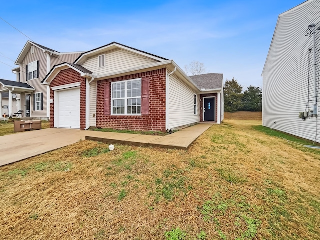 traditional home featuring brick siding, a garage, concrete driveway, and a front yard