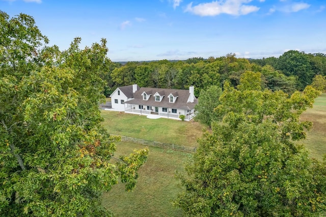 drone / aerial view featuring a forest view