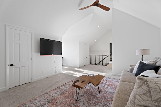 living room with light carpet, high vaulted ceiling, baseboards, and ceiling fan