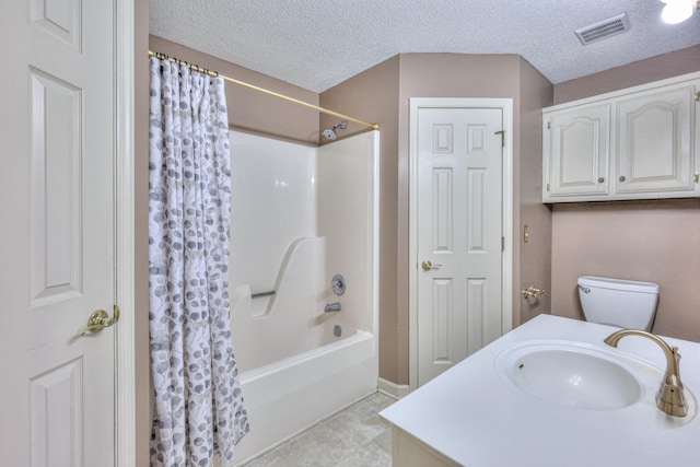 full bath featuring visible vents, toilet, shower / bath combo, a textured ceiling, and vanity