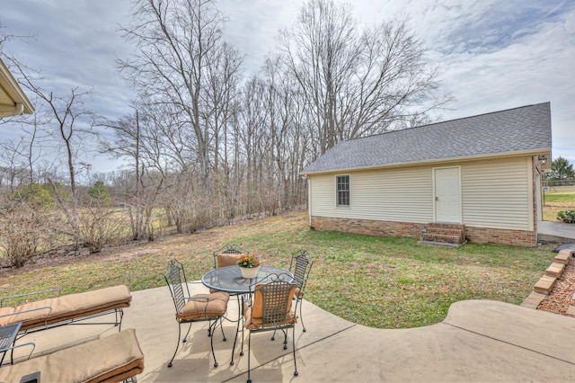 view of patio / terrace with outdoor dining space and entry steps