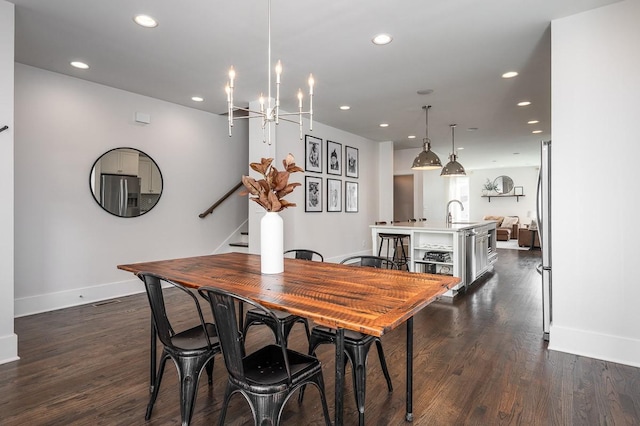 506B 36th Ave N, Nashville, TN 37209 - dining space with stairs, baseboards, recessed lighting, dark wood finished floors, and a chandelier
