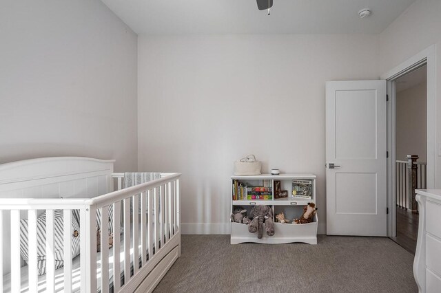 506B 36th Ave N, Nashville, TN 37209 - carpeted bedroom with a crib and baseboards
