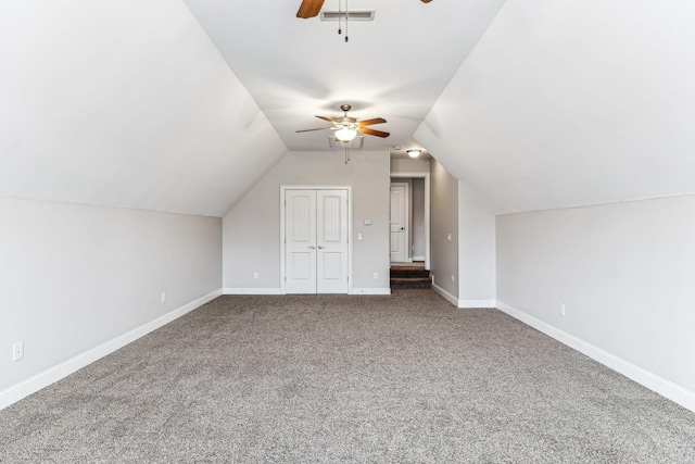 bonus room featuring vaulted ceiling, baseboards, carpet floors, and ceiling fan