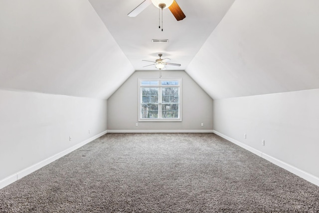 bonus room featuring visible vents, baseboards, carpet, lofted ceiling, and a ceiling fan