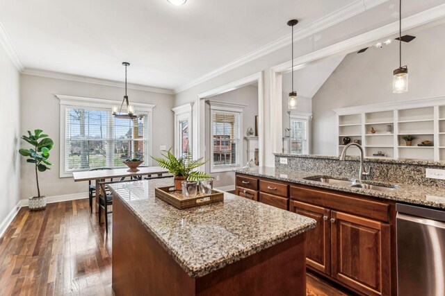 kitchen featuring dark wood-type flooring, a sink, light stone counters, a center island, and dishwasher