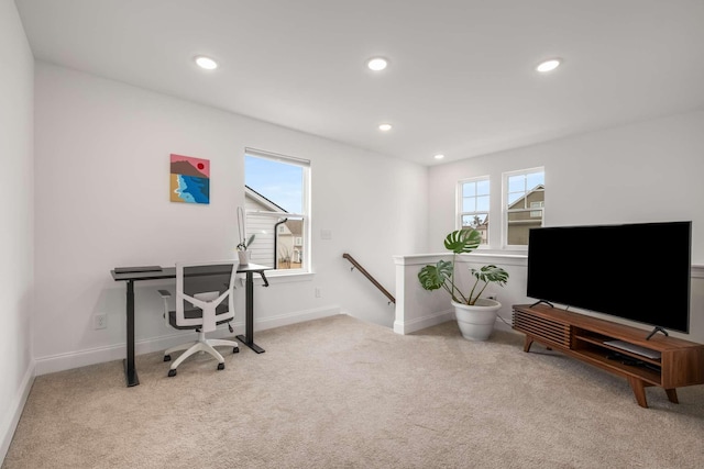 carpeted home office featuring a wealth of natural light, recessed lighting, and baseboards