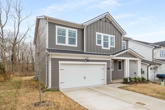 view of front of house featuring concrete driveway, a garage, and board and batten siding