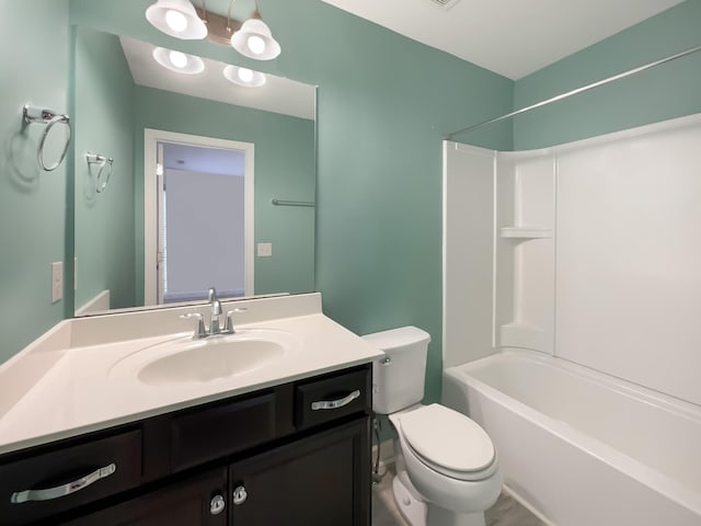 full bathroom featuring shower / bathtub combination, toilet, an inviting chandelier, and vanity