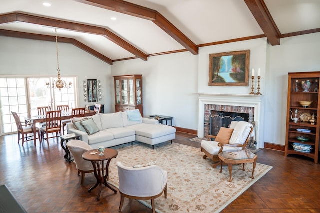 living area featuring baseboards, lofted ceiling with beams, recessed lighting, a brick fireplace, and a notable chandelier