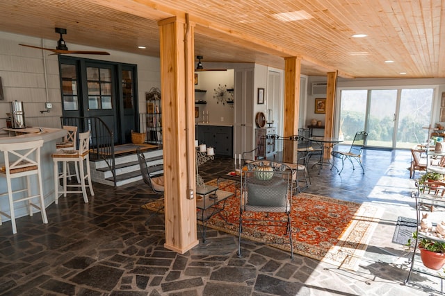 living area featuring wooden ceiling, recessed lighting, and ceiling fan