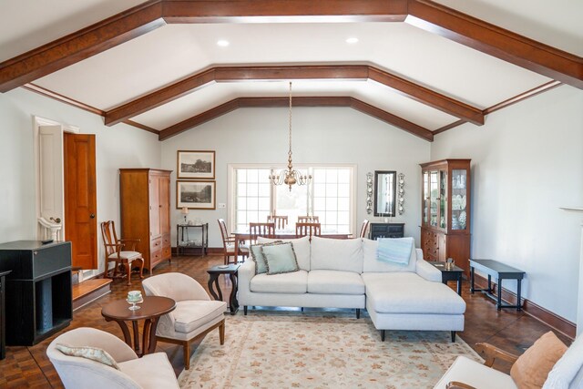 living room featuring lofted ceiling with beams, baseboards, and an inviting chandelier