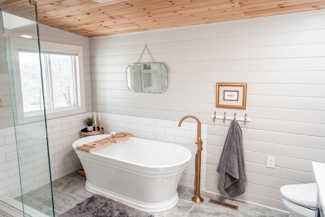 full bath featuring visible vents, toilet, wood ceiling, a tile shower, and a freestanding tub