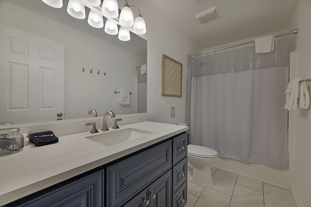 bathroom with vanity, toilet, shower / bathtub combination with curtain, and marble finish floor