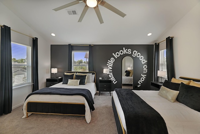 carpeted bedroom with lofted ceiling, recessed lighting, a ceiling fan, and visible vents