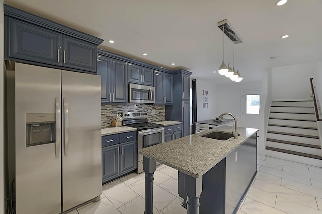 kitchen with marble finish floor, a sink, appliances with stainless steel finishes, decorative backsplash, and light stone countertops