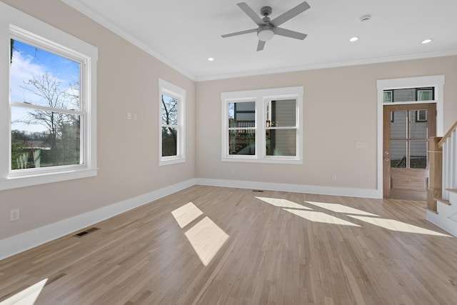 interior space with stairs, visible vents, baseboards, and crown molding