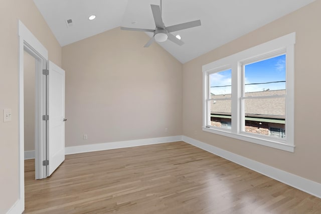 empty room with light wood-style flooring and baseboards