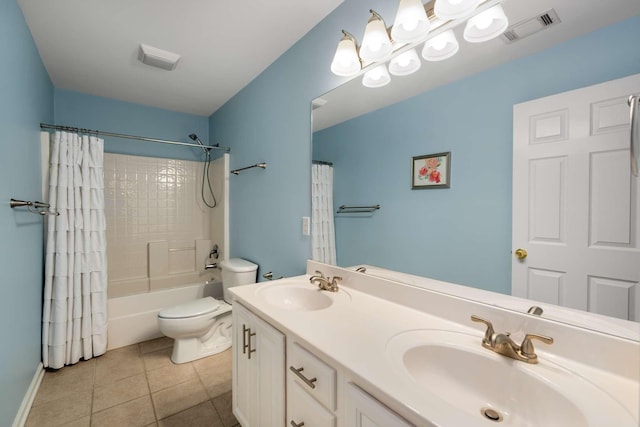 bathroom with a sink, visible vents, toilet, and tile patterned floors