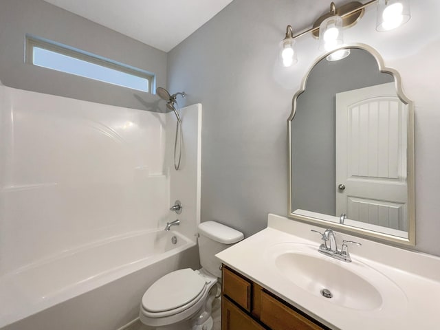 full bath with vanity, toilet, and bathing tub / shower combination