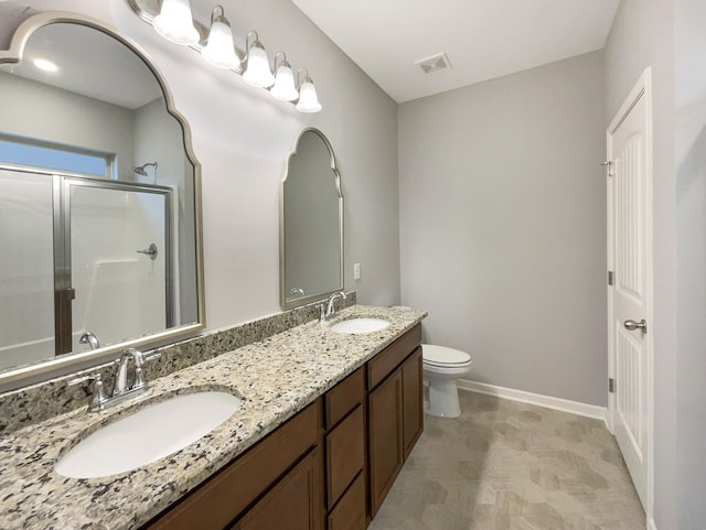 bathroom with a sink, visible vents, baseboards, and a shower stall