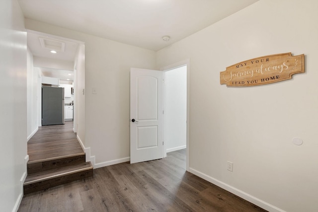 753 Theta Pike, Columbia, TN 38401 - hall featuring baseboards, attic access, and wood finished floors